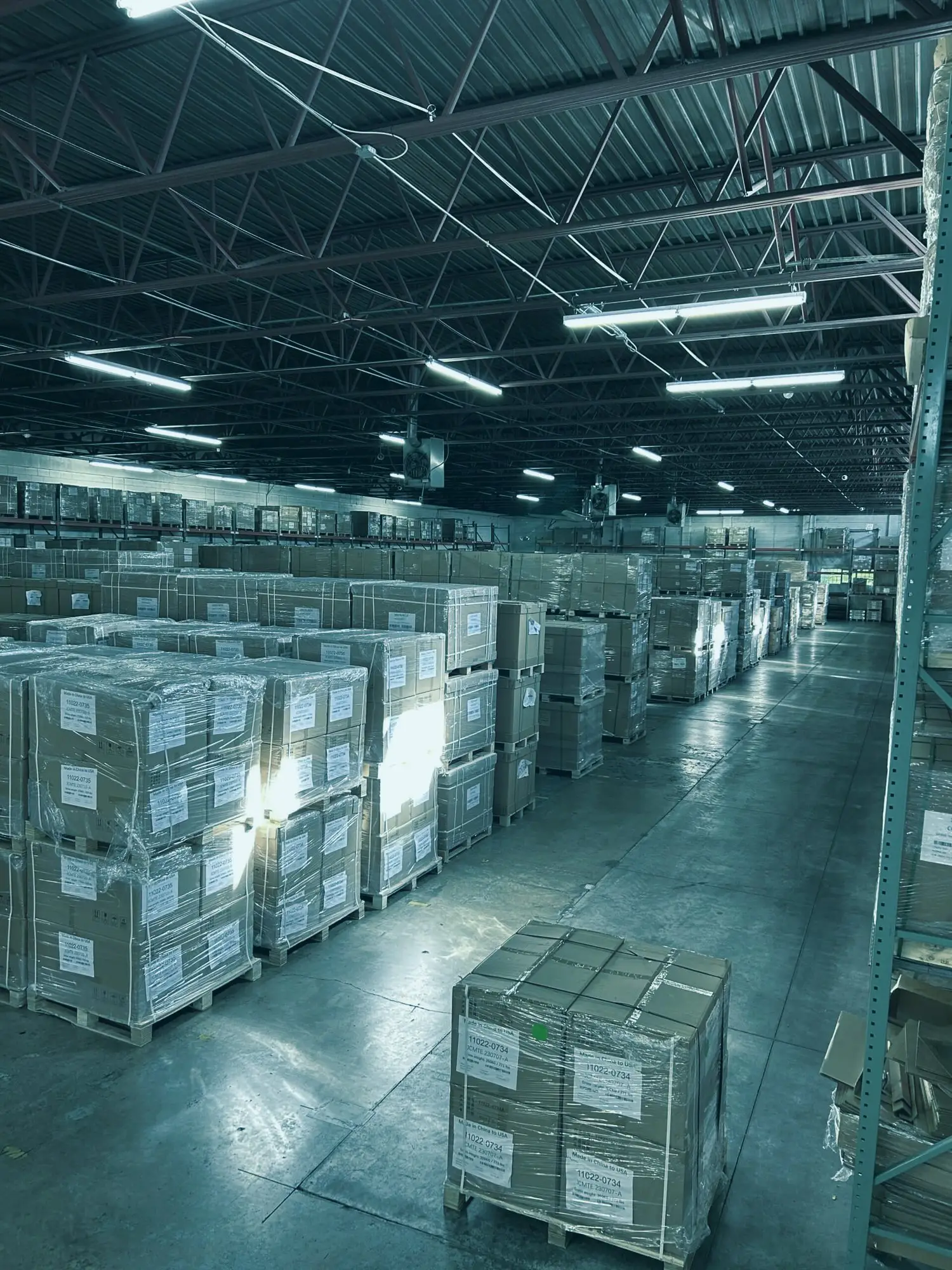 CMT Imports warehouse in Cincinnati, stocked with pallets of components